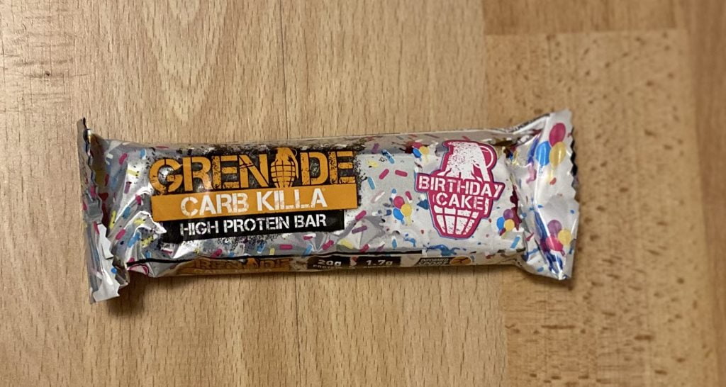 Birthday Cake. Best Grenade Carb Killa Flavour - We Reviewed 12 Carb Killa Flavours. We bought the Grenade Carb Killa Selection Box to review every flavour and find out which of the 12 bars is the tastiest! By Gymnasium Post (gymnasiumpost.com).